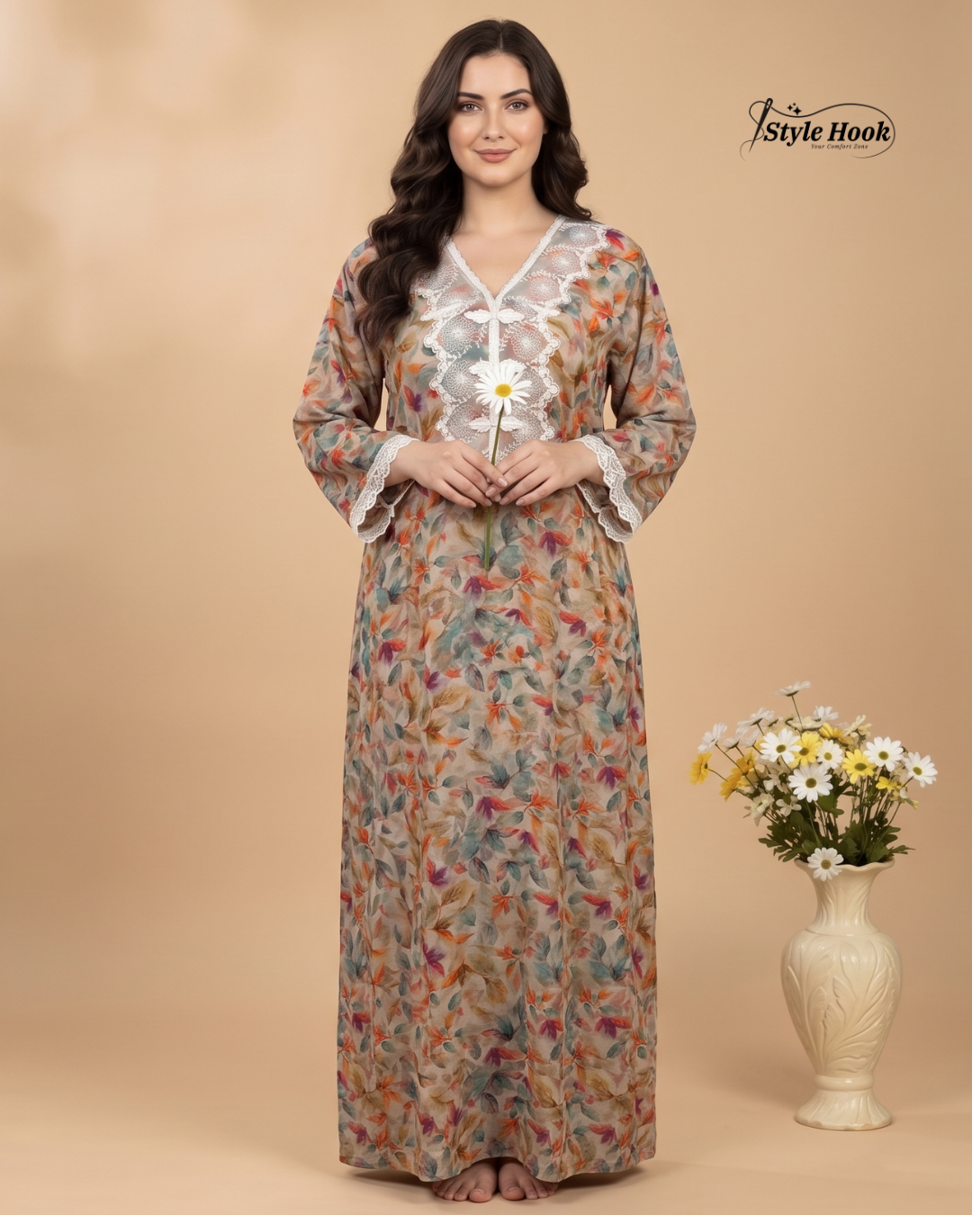 Woman wearing a floral dress with a beige background and 'Style Hook' branding.